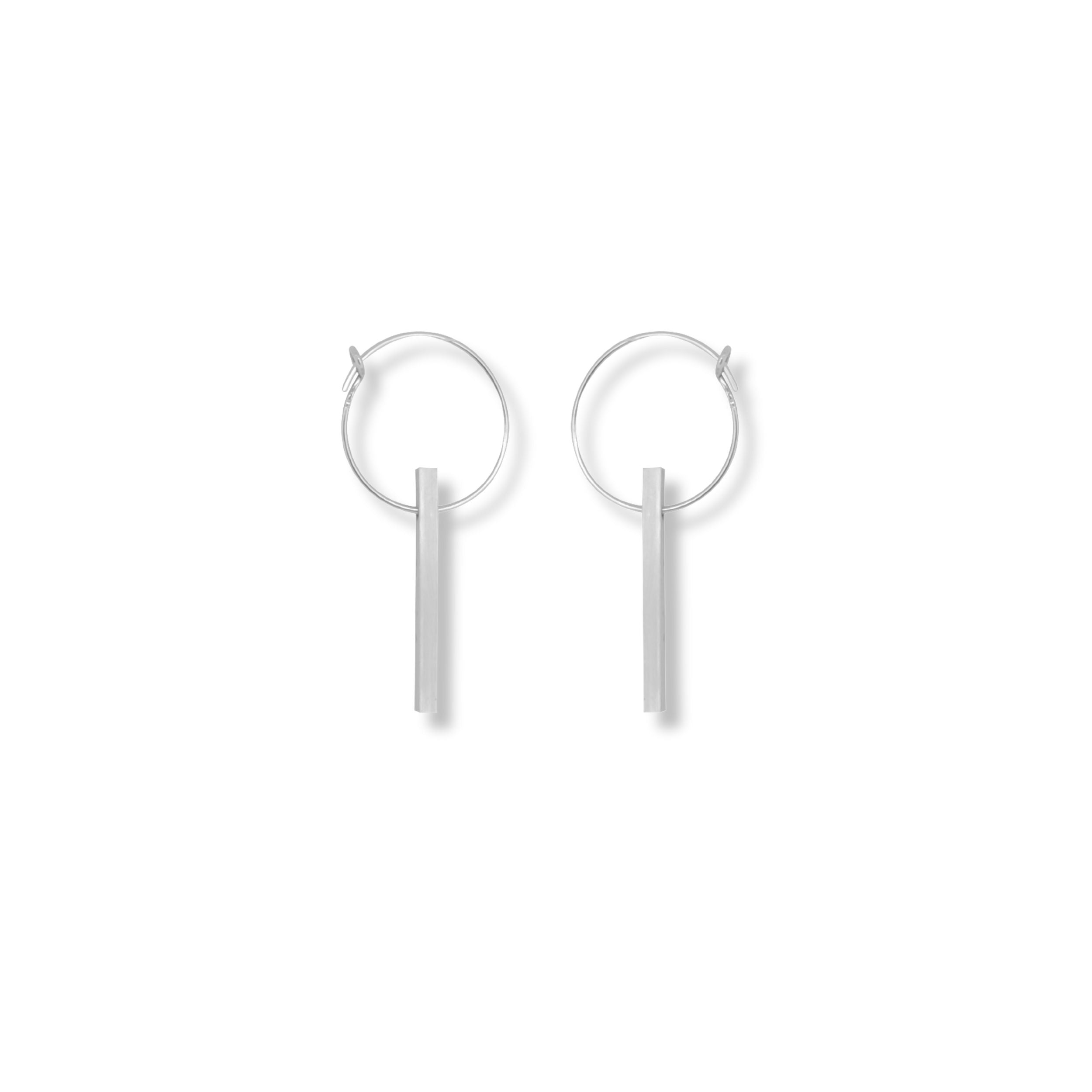 The Minimalist Scandinavian Ray earrings by MeganCollinsJewellery with the delicate circle and bar, are an abstract representation of the sun. Wear them as a reminder to shine your inner light.