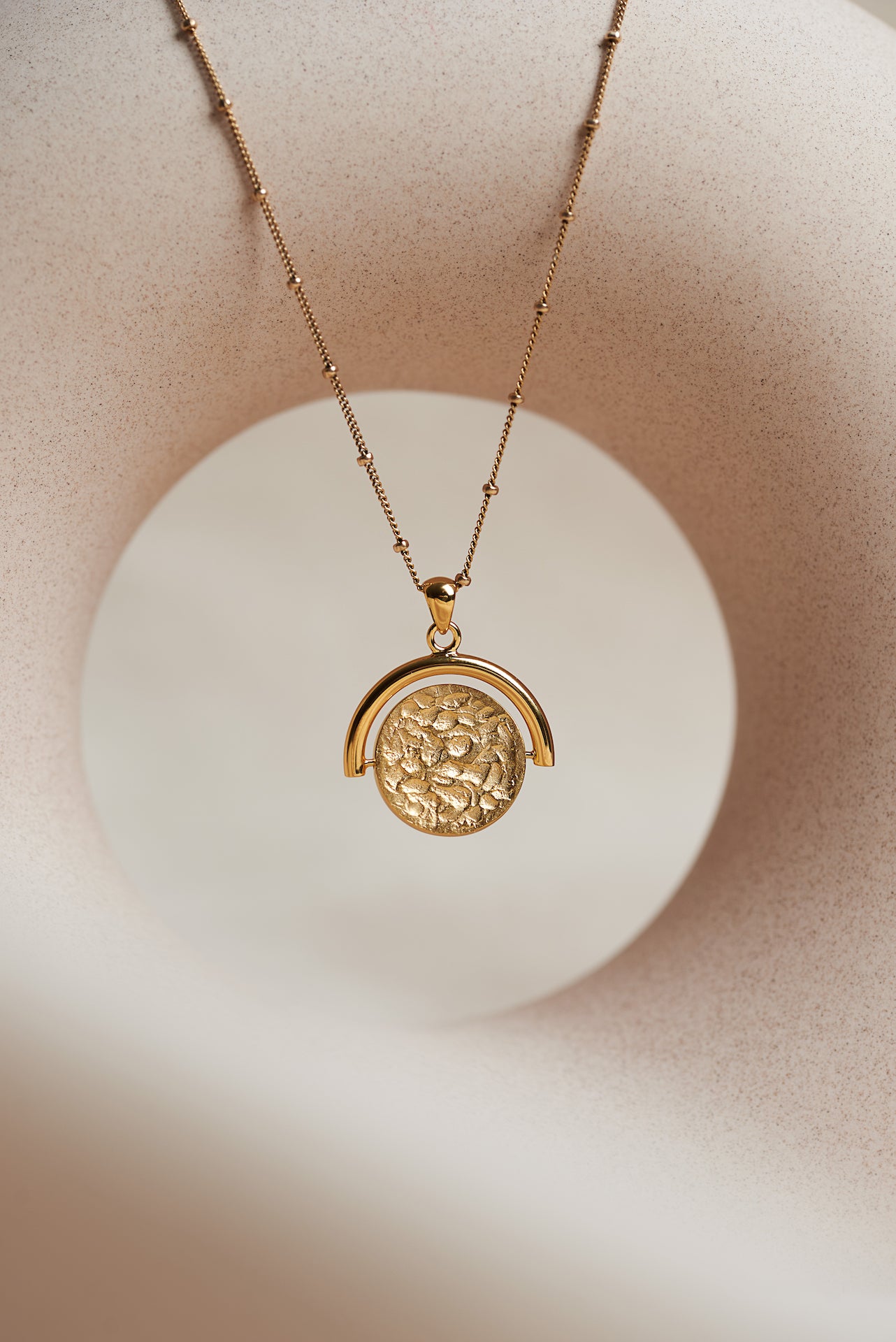 Designed by Megan Collins, the "Equilibrium Spinner" represents the power of embracing both the masculine and feminine energies within us all.