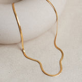 Designed by Megan Collins, the "Flow Necklace" is a classic must-have in every minimalists’ wardrobe. Created to represent the perfect equilibrium between stability and change.