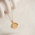 Designed by Megan Collins, the "Equilibrium Spinner" represents the power of embracing both the masculine and feminine energies within us all.