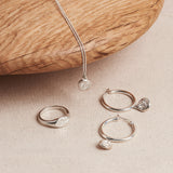 DESIGNED BY MEGAN COLLINS, the Limited Edition Equilibrium Collection that celebrates the art of balance in every aspect of life.