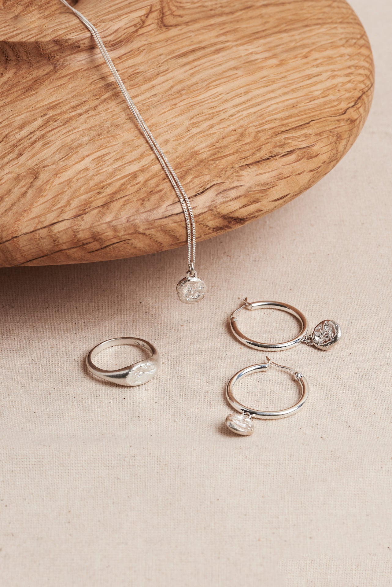 Designed by Megan Collins, the "Balance Hoops" are made to be worn as a reminder that life's beauty lies in the balance between hard work and play.