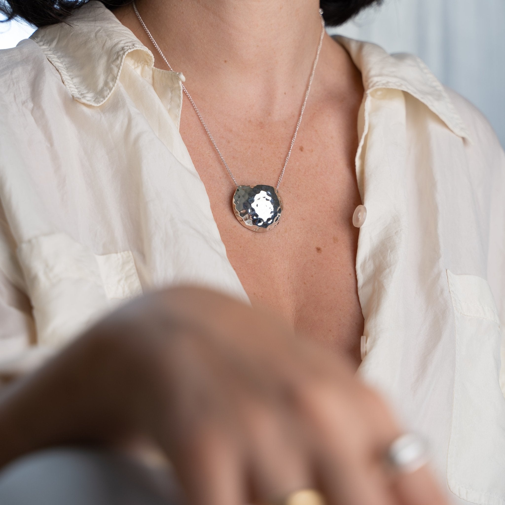 Hammered texture domed 100% recycled sterling silver handmade necklace MeganCollinsJewellery