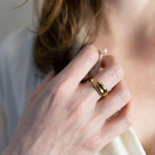 The Violaine by MeganCollinsJewellery that beautifully captures the essence of letting go and trusting the flow of life.