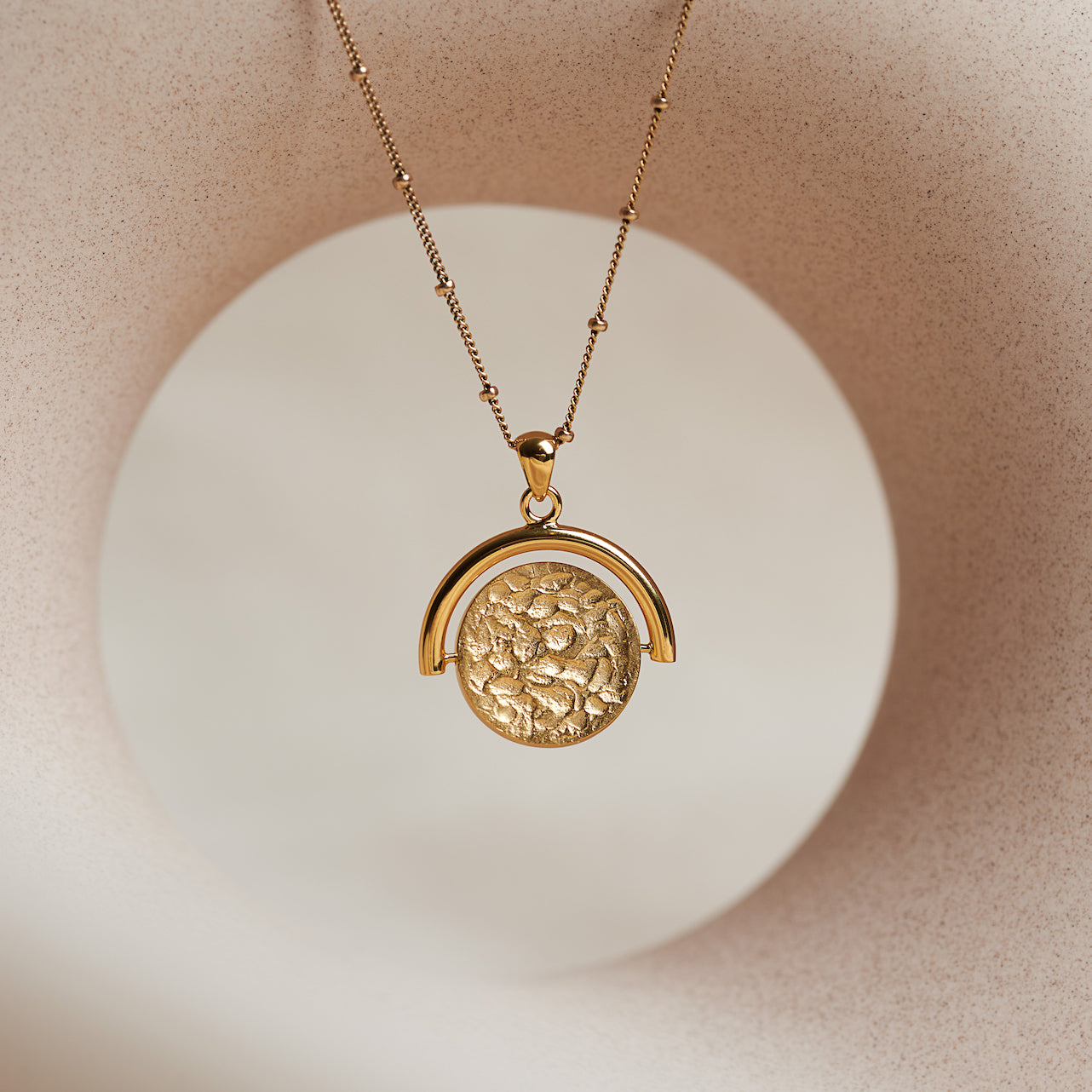 Designed by Megan Collins, the "Equilibrium Spinner" represents the power of embracing both the masculine and feminine energies within us all.